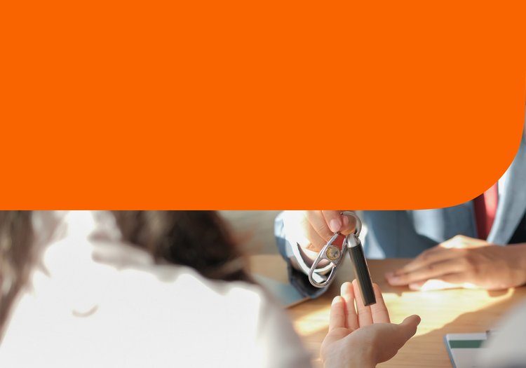 A person handing over car keys