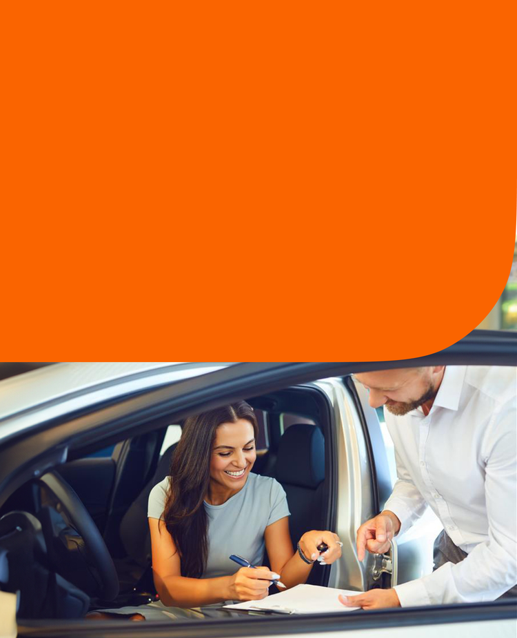 A woman trades in her car.