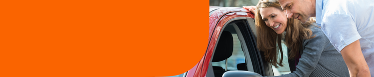 A couple evaluates a used car